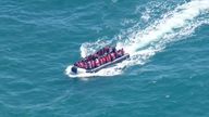 Boat of immigrants arriving in UK