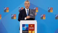 NATO Secretary General Jens Stoltenberg displays the Strategic Concept booklet during his news conference at a NATO summit in Madrid, Spain June 29, 2022. REUTERS/Susana Vera
