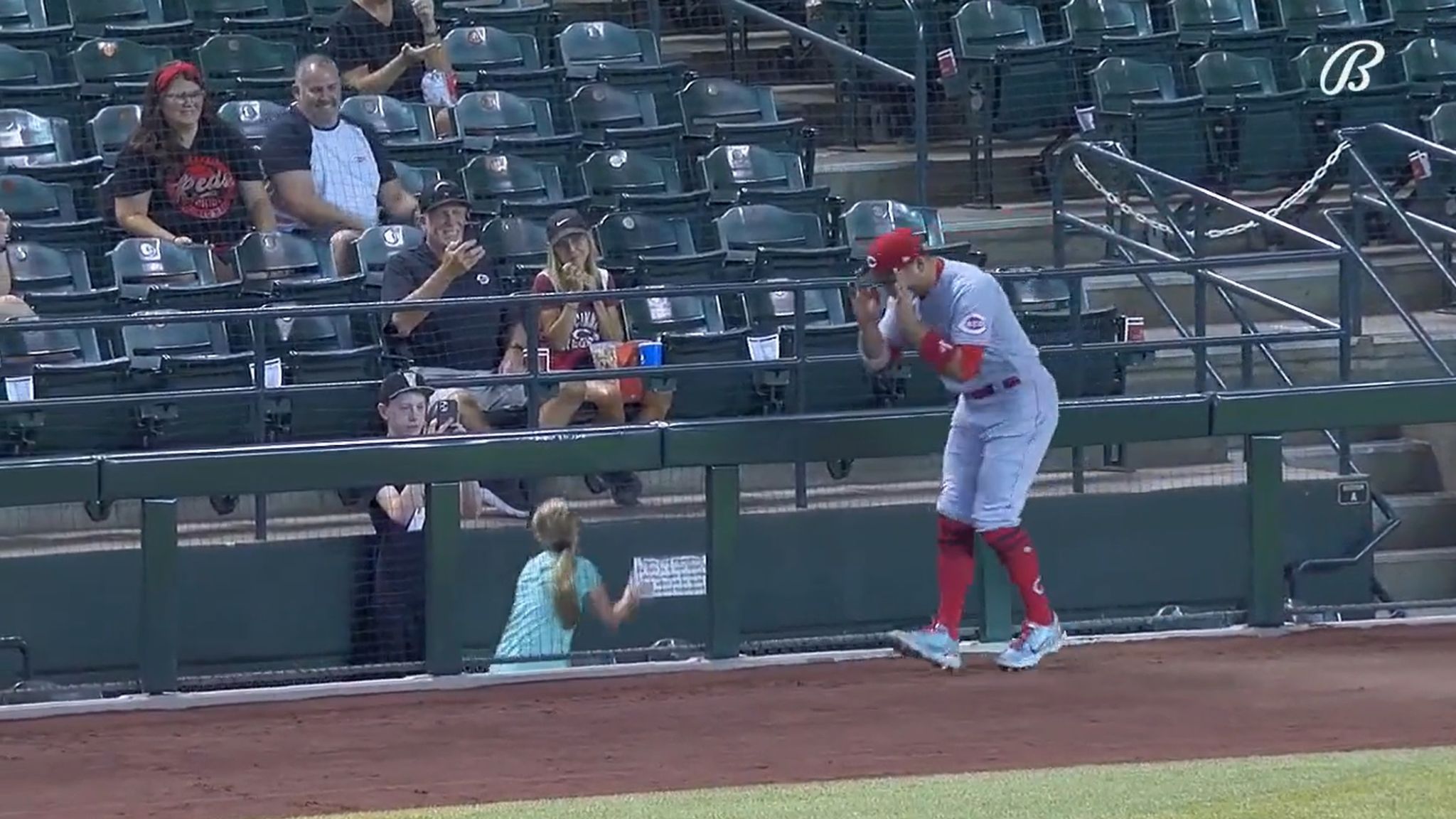 Baseball star Joey Votto performs 'Griddy dance' with young fan after she holds up sign saying
