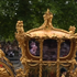 Gold State Coach features old footage of Queen as Platinum Jubilee street pageant under way