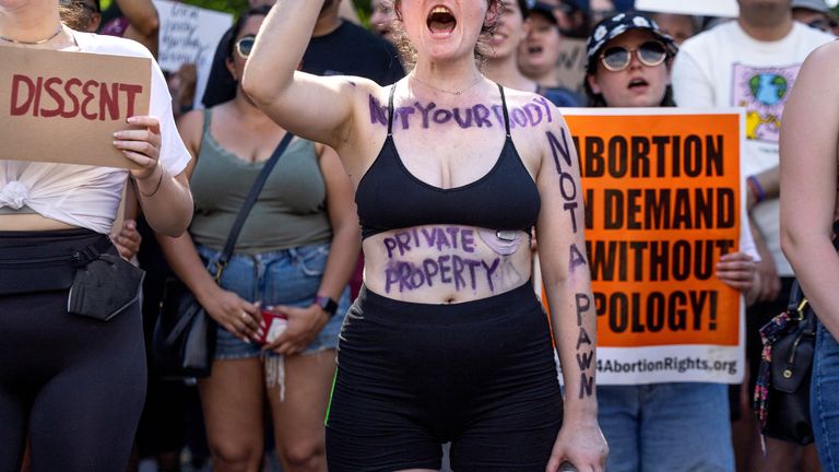 Abortion rights activists demonstrate outside the Supreme Court in June