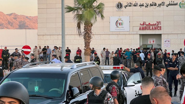 Members of the Jordanian Gendarmerie stand outside a hospital after a toxic gas leak from a storage tank in Jordan's port of Aqaba