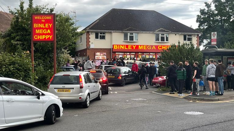 People gather outside Binley Mega Chippy near Coventry after the chip shop went viral on TikTok. Pic: Simon Langley