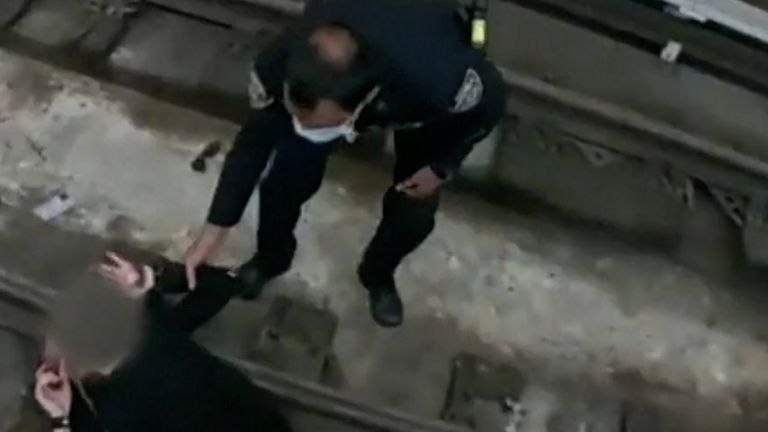 Two NYPD officers rescued a woman who fell on the subway track, having collapsed due to a ‘medical episode’