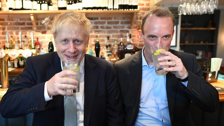 Conservative party leadership candidate Boris Johnson (left) and Dominic Raab, have a drink in The Victoria public house in Oxshott, Surrey. -  25-Jun-2019
