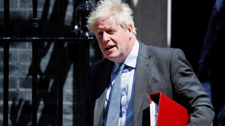 British Prime Minister Boris Johnson leaves 10 Downing Street to take questions in parliament, in London, Britain June 15, 2022. REUTERS/Peter Nicholls
