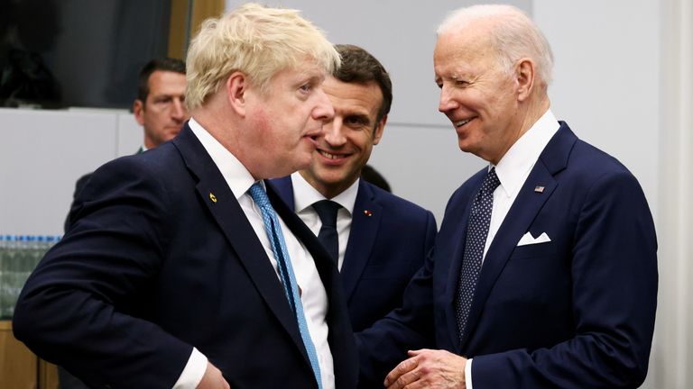 British Prime Minister Boris Johnson talks with US President Joe Biden and French President Emmanuel Macron before the G7 leaders meet during the NATO summit on Russia's invasion of Ukraine, at the alliance's headquarters in Brussels, Belgium March 24, 2022. REUTERS / Henry Nicholls / Pool