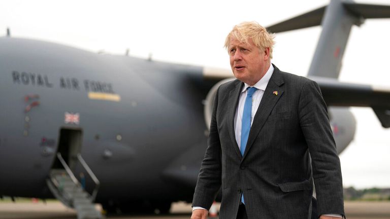 Britain&#39;s Prime Minister Boris Johnson walks, after arriving at RAF Brize Norton, in Oxfordshire, England, Saturday, June 18, 2022, following a trip to Ukraine. Johnson met with President Volodymyr Zelenskyy in Kyiv to offer continued aid and military training. (Joe Giddens/Pool Photo via AP)