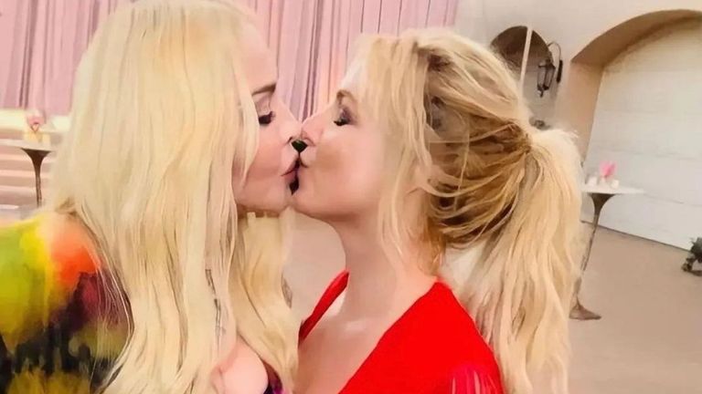 Britney Spears and Madonna recreate their famous MTV awards kiss at her wedding. Pic: Britney Spears/Instagram
