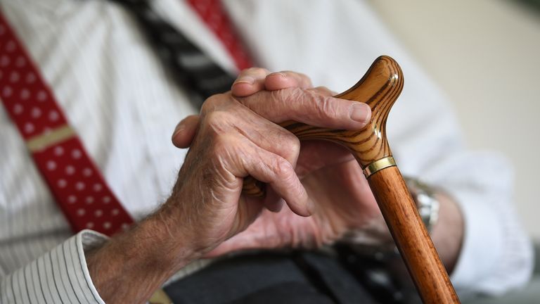 EMBARGOED TO 0001 THURSDAY MARCH 31 File photo dated 18/05/2017 of an elderly man holding a walking stick, as care home residents will have the right to visits and care from a loved one, the Scottish Government has said.
