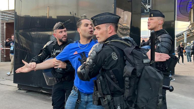 Soccer Football - Champions League Final - Liverpool v Real Madrid - Stade de France, Saint-Denis near Paris, France - May 28, 2022 French police arrest a man outside Stade de France before Champions League Final REUTERS/Fernando Kallas