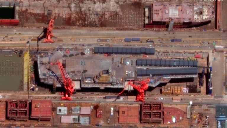 This satellite image from Maxar Technologies shows construction of China&#39;s Type 003 aircraft carrier at the Jiangnan Shipyard northeast of Shanghai, China, May 31, 2022. China&#39;s most advanced aircraft carrier to date appears to be nearing completion, satellite photos analyzed by The Associated Press showed Friday, June 3, as experts suggested the vessel could be launched soon. (Satellite image ..2022 Maxar Technologies via AP)