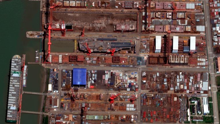 This satellite image from Maxar Technologies shows construction of China&#39;s Type 003 aircraft carrier at the Jiangnan Shipyard northeast of Shanghai, China, May 31, 2022. China&#39;s most advanced aircraft carrier to date appears to be nearing completion, satellite photos analyzed by The Associated Press showed Friday, June 3, as experts suggested the vessel could be launched soon. (Satellite image ..2022 Maxar Technologies via AP)