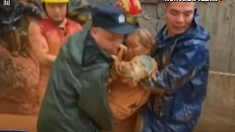 People pulled out from landslides in China