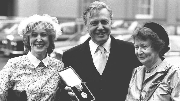 Sir David was first knighted by the Queen in 1985 (pictured with wife Jane and daughter Susan)
