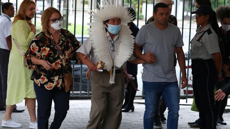 People arrive for the funeral of British journalist Dom Phillips who was murdered in the Amazon along with indigenous expert Bruno Pereira, at a cemetery in Niteroi, near Rio de Janeiro, Brazil June 26, 2022. REUTERS/Pilar Olivares
