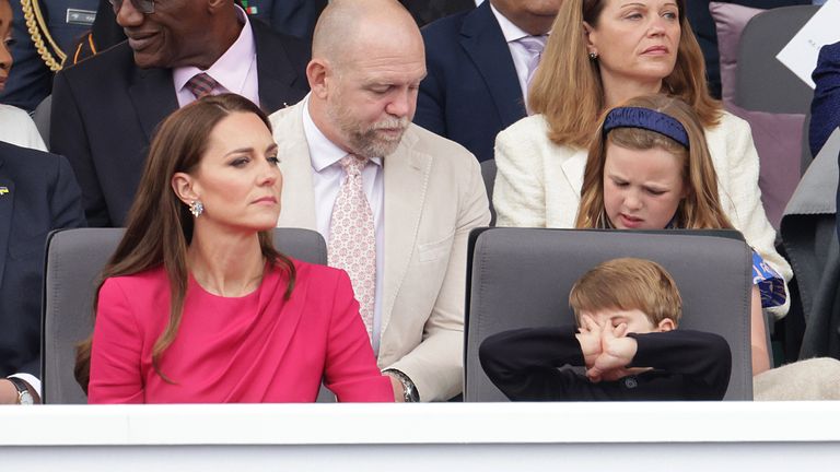 The Duchess of Cambridge, Prince Louis, Mike Tindall and Mia Tindall during the Platinum Jubilee Pageant in front of Buckingham Palace, London, on day four of the Platinum Jubilee celebrations. Picture date: Sunday June 5, 2022.
