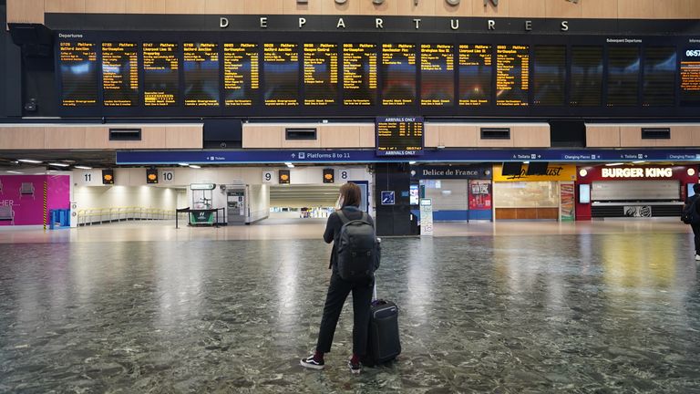 The scene at Euston Station in London as the biggest rail strike in 30 years begins