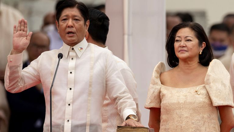 Ferdinand "Bongbong" Marcos Jr., the son and namesake of the late dictator Ferdinand Marcos, takes oath beside his wife Louise Araneta-Marcos during the inauguration ceremony at the National Museum in Manila, Philippines, June 30, 2022. REUTERS/Eloisa Lopez
