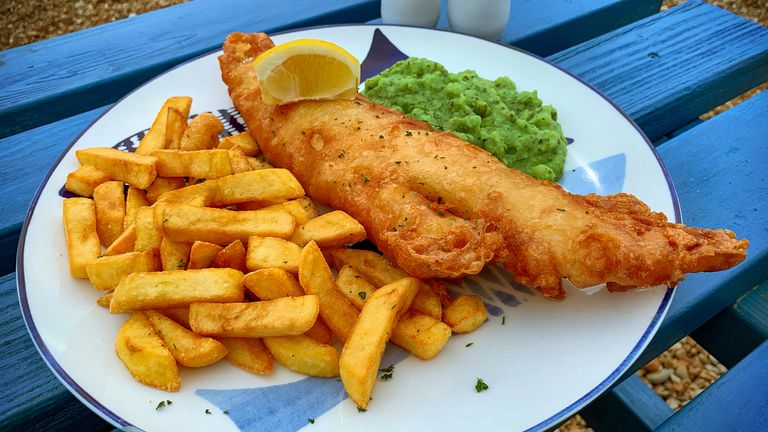 Classic fish and chips with mushy peas