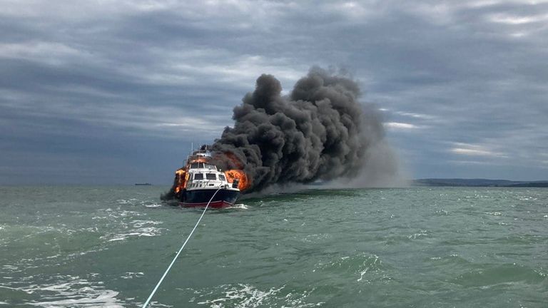 Handout photo issued by Gosport and Fareham Inshore Rescue Service (GAFIRS) of a motor cruiser which caught fire and sank outside Portsmouth Harbour in Hampshire. Issue date: Monday June 20, 2022.
