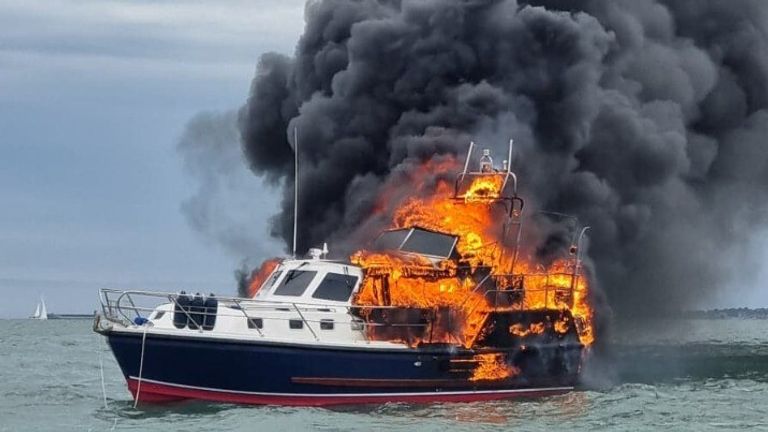 Handout photo issued by Gosport and Fareham Inshore Rescue Service (GAFIRS) of a motor cruiser which caught fire and sank outside Portsmouth Harbour in Hampshire. Issue date: Monday June 20, 2022.
