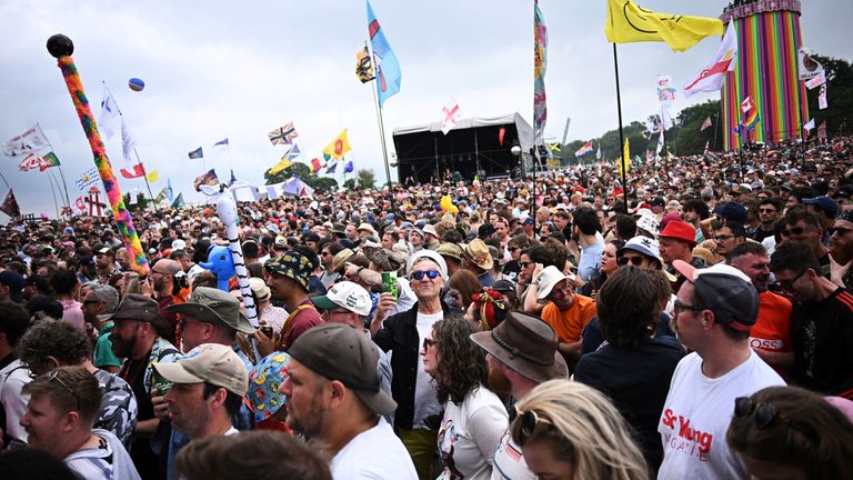 Revellers dance at The Park stage at Worthy Farm in Somerset during the Glastonbury Festival in Britain, June 24, 2022. REUTERS/Dylan Martinez