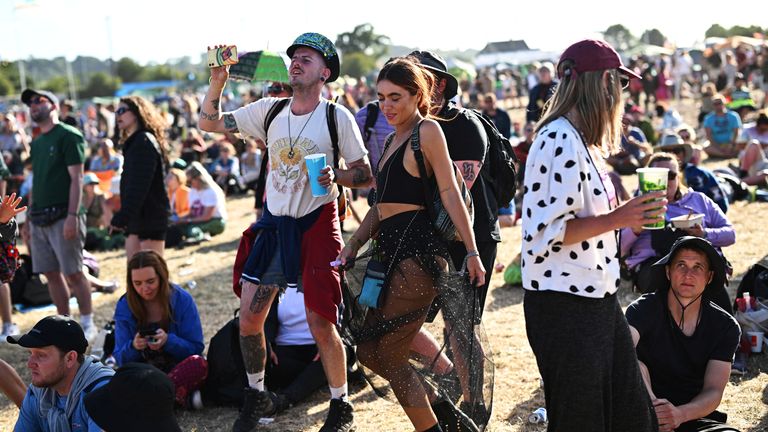 Revellers dance at Worthy Farm in Somerset during the Glastonbury Festival in Britain, June 26, 2022. REUTERS/Dylan Martinez
