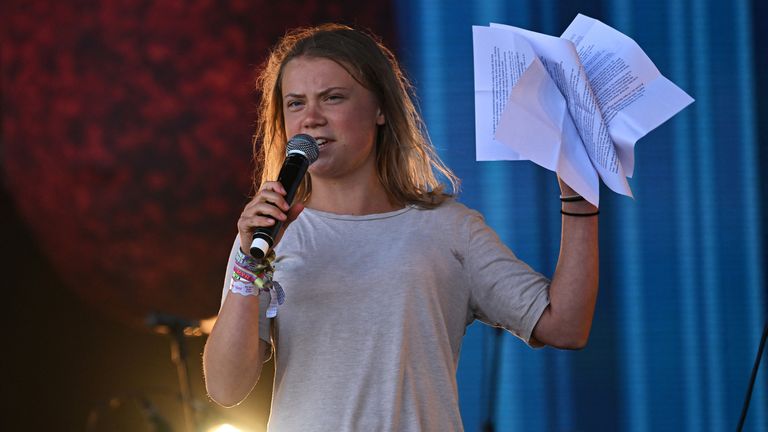 Climate activist Greta Thunberg speaks on the Pyramid stage at Worthy Farm in Somerset during the Glastonbury Festival in Britain, June 25, 2022. REUTERS/Dylan Martinez