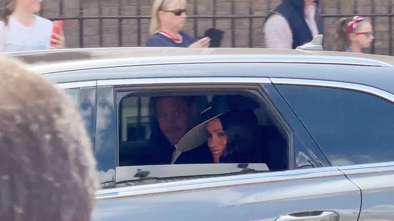 Britain&#39;s Prince Harry and Meghan, Duchess of Sussex are pictured in a car, in London, Britain June 2, 2022 in this screengrab obtained from a social media video. Emily Sevenoaks/via REUTERS  THIS IMAGE HAS BEEN SUPPLIED BY A THIRD PARTY. MANDATORY CREDIT. NO RESALES. NO ARCHIVES.