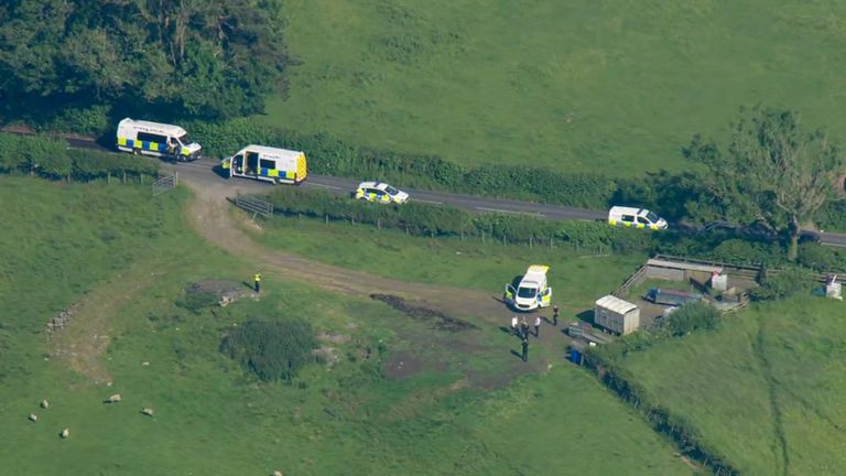 Grabs taken from Sky news helicopter footage of the helicopter crash in Yorkshire 