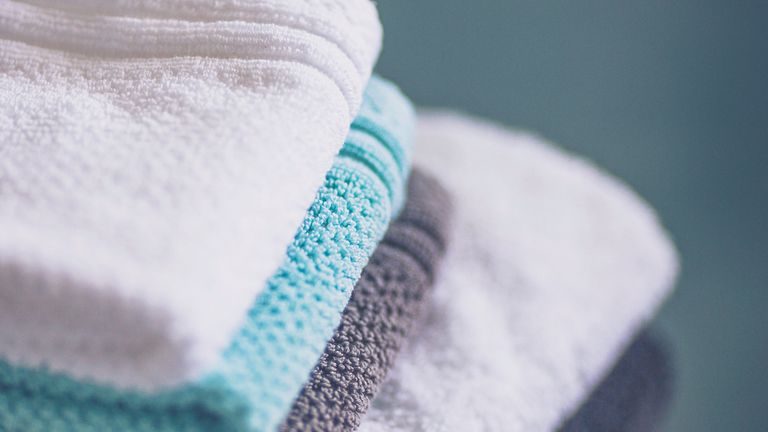 Image copyright Catherine Lane 2015 Stack of freshly laundered towels and washcloths

