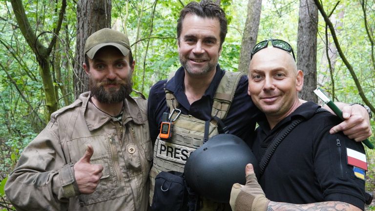 John Sparks with members of a tank unit in Ukraine