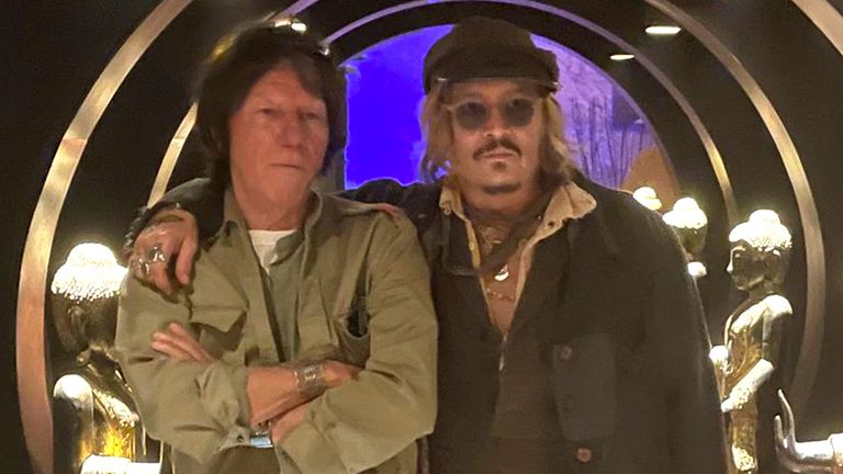 Johnny Depp (right) and musician Jeff Beck (left) during their visit to curry house Varanasi in Birmingham