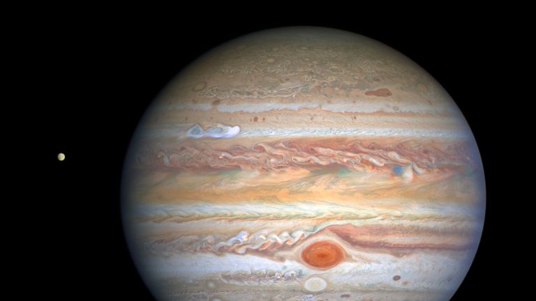 This Aug 25, 2020 image captured by NASA&#39;s Hubble Space Telescope shows the planet Jupiter and one of its moons, Europa, at left, when the planet was 406 million miles from Earth. The new photo was released by the Space Telescope Science Institute in Baltimore on Thursday, Sept. 17, 2020. (NASA, ESA, STScI, A. Simon, M. via AP) Pic: AP/NASA