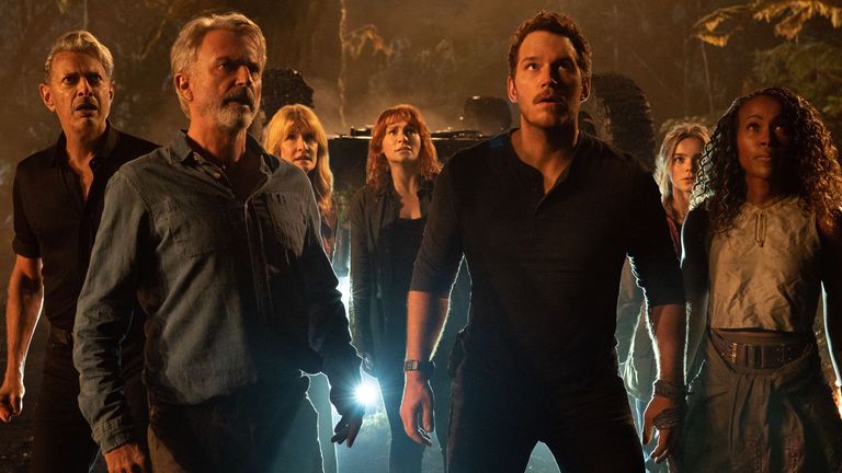 L-R: Dr Ian Malcolm (Jeff Goldblum), Dr Alan Grant (Sam Neill), Dr Ellie Sattler (Laura Dern), Claire Dearing (Bryce Dallas Howard), Owen Grady (Chris Pratt), Maisie Lockwood (Isabella Sermon) and Kayla Watts (DeWanda Wise) in Jurassic World Dominion. Pic: Universal Studios and Amblin Entertainment