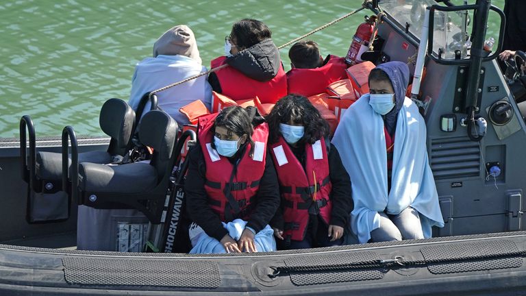 A group of people thought to be migrants are brought in to Dover, Kent, following a small boat incident in the Channel. Picture date: Thursday June 16, 2022.
