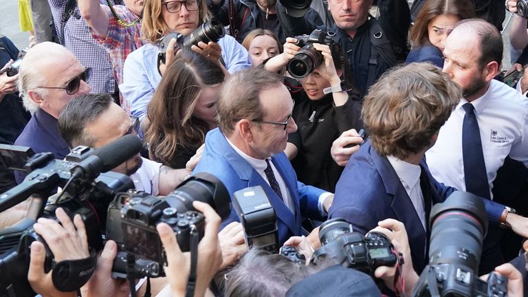 Actor Kevin Spacey arrives at Westminster Magistrates Court in London, after being charged with sexual offenses against three men.  The 62-year-old former Hollywood star is charged with four counts of sexual assault and one count of causing a person to engage in nonconsensual penetrative sexual activity.  Picture date: Thursday June 16, 2022.