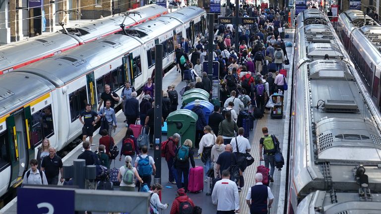Passengers at London King&#39;s Cross station. Trains will be disrupted due to industrial action as the RMT has announced industrial action on June 21, 23, and 25. Picture date: Monday June 20, 2022.

