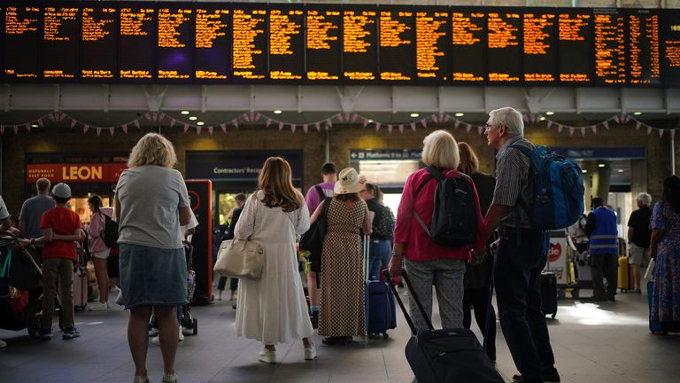 Passengers at London King&#39;s Cross station. Trains will be disrupted due to industrial action as the RMT has announced industrial action on June 21, 23, and 25. Picture date: Monday June 20, 2022.