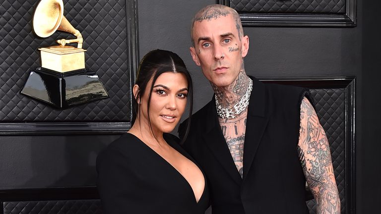Kourtney Kardashian, left, and Travis Barker arrive at the 64th Annual Grammy Awards at the MGM Grand Garden Arena on Sunday, April 3, 2022, in Las Vegas. 
PIC:AP