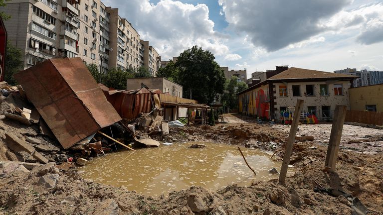 A crater is seen at a complex of a kindergarten following a Russian missile attack in Kyiv