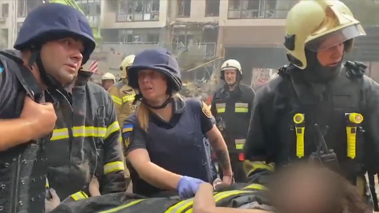 A woman has been taken for medical treatment after being rescued from a building hit by a Russian strike.