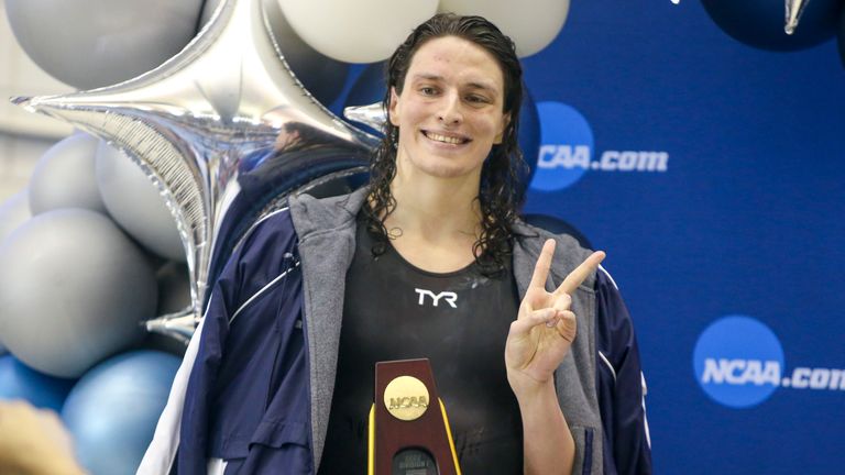 Mar 17, 2022; Atlanta, Georgia, USA; Penn Quakers swimmer Lia Thomas holds a trophy after finishing first in the 500 free at the NCAA Womens Swimming & Diving Championships at Georgia Tech. Mandatory Credit: Brett Davis-USA TODAY Sports
