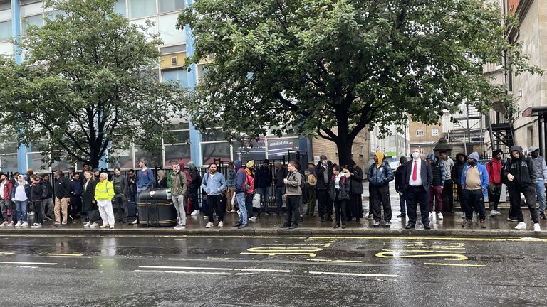 People waiting at a bus stop in Paddington in London, as Members of the Rail, Maritime and Transport union (RMT) are taking industrial action in a dispute over jobs and pensions. Picture date: Monday June 6, 2022.
