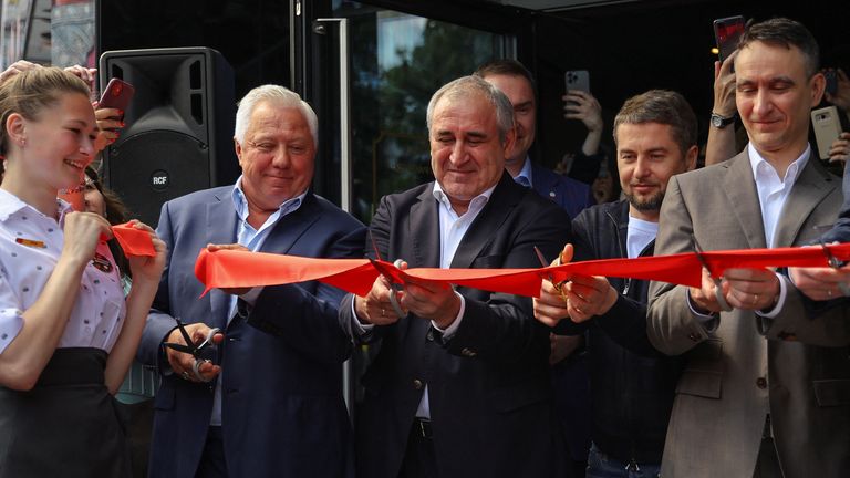 Owner Alexander Govor cuts the ribbon to open &#39;Vkusno & tochka&#39; in Moscow