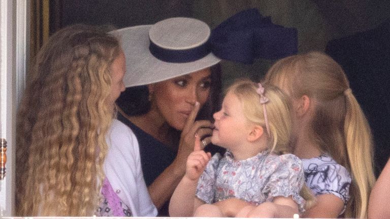 Meghan Markle with Savannah Phillips and Mia Tindall in the  Major General&#39;s office overlooking The Trooping of the Colour on Horse Guards Parade....
