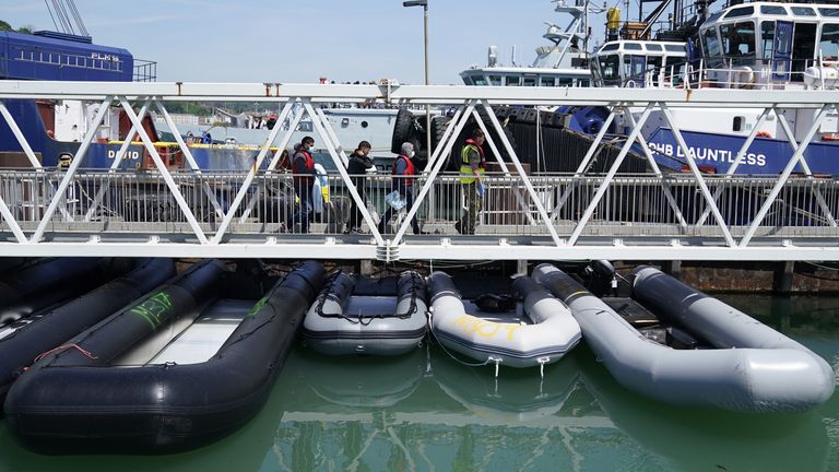 A group of people thought to be migrants are brought in to Dover, Kent following a small boat incident in the Channel. Picture date: Wednesday June 15, 2022.