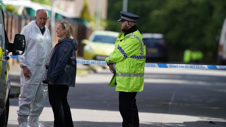 The scene in Miles Platting, Manchester, following the domestic incident where a 14-year-old boy died and his mother was injured in a "ferocious" stabbing on Thursday. A police spokesman said the suspected attacker, believed to have been known to the victims, should not be approached if seen by the public. Picture date: Friday June 10, 2022.
