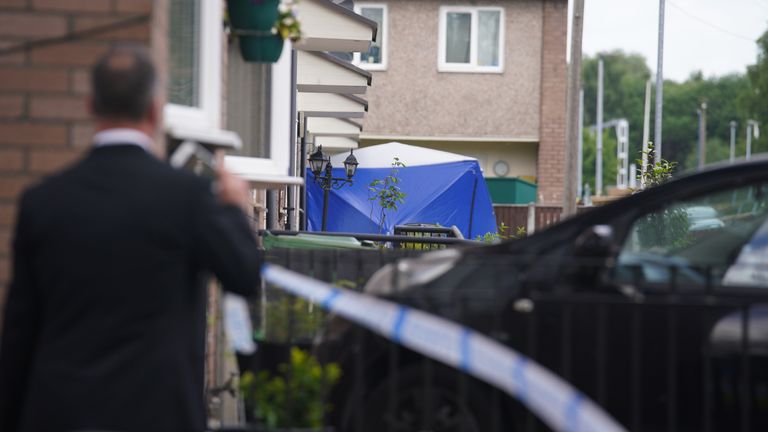 The scene in Miles Platting, Manchester, following the domestic incident where a 14-year-old boy died and his mother was injured in a "ferocious" stabbing on Thursday. A police spokesman said the suspected attacker, believed to have been known to the victims, should not be approached if seen by the public. Picture date: Friday June 10, 2022.
